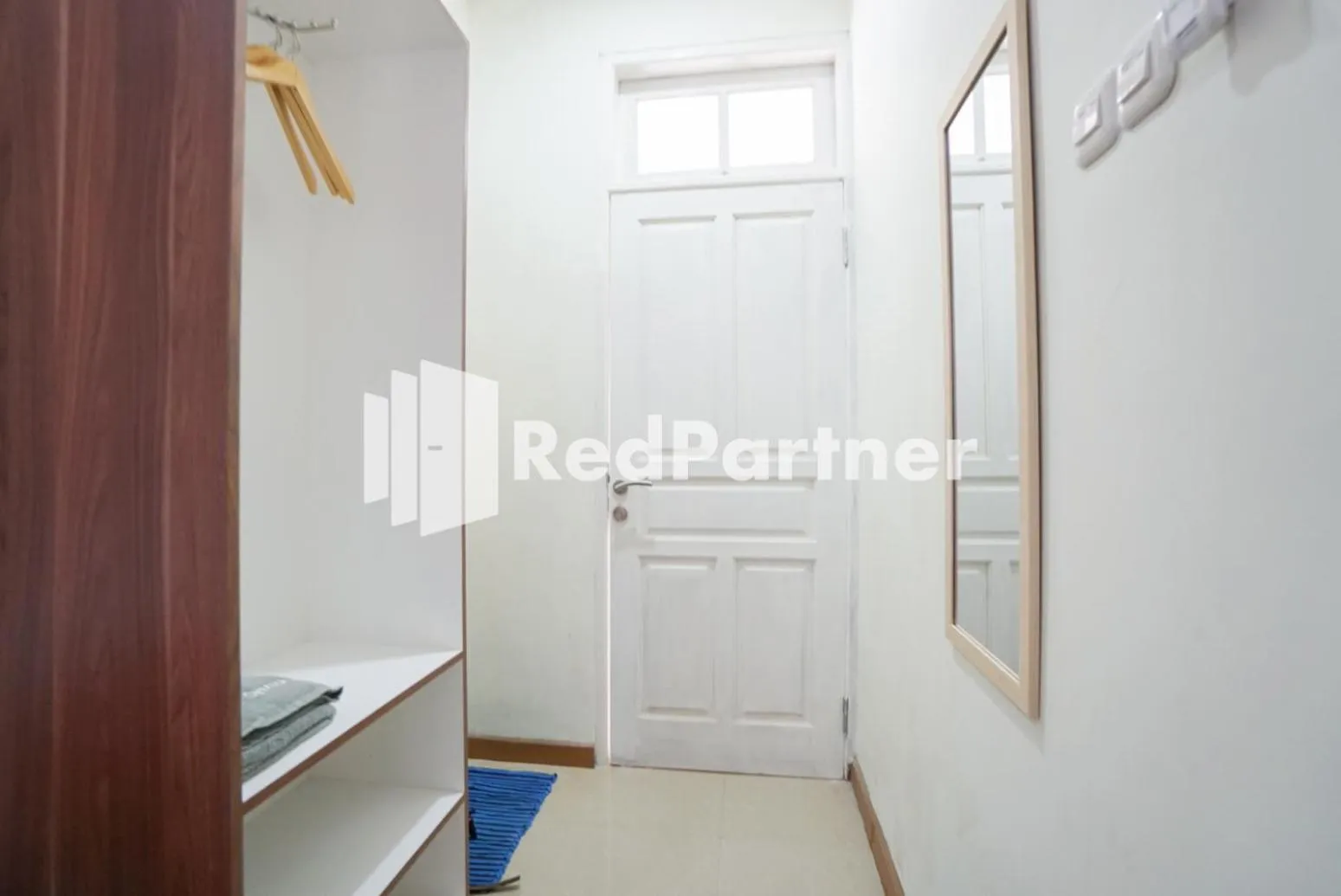 Bedroom in Fazza Syariah Mitra RedDoorz