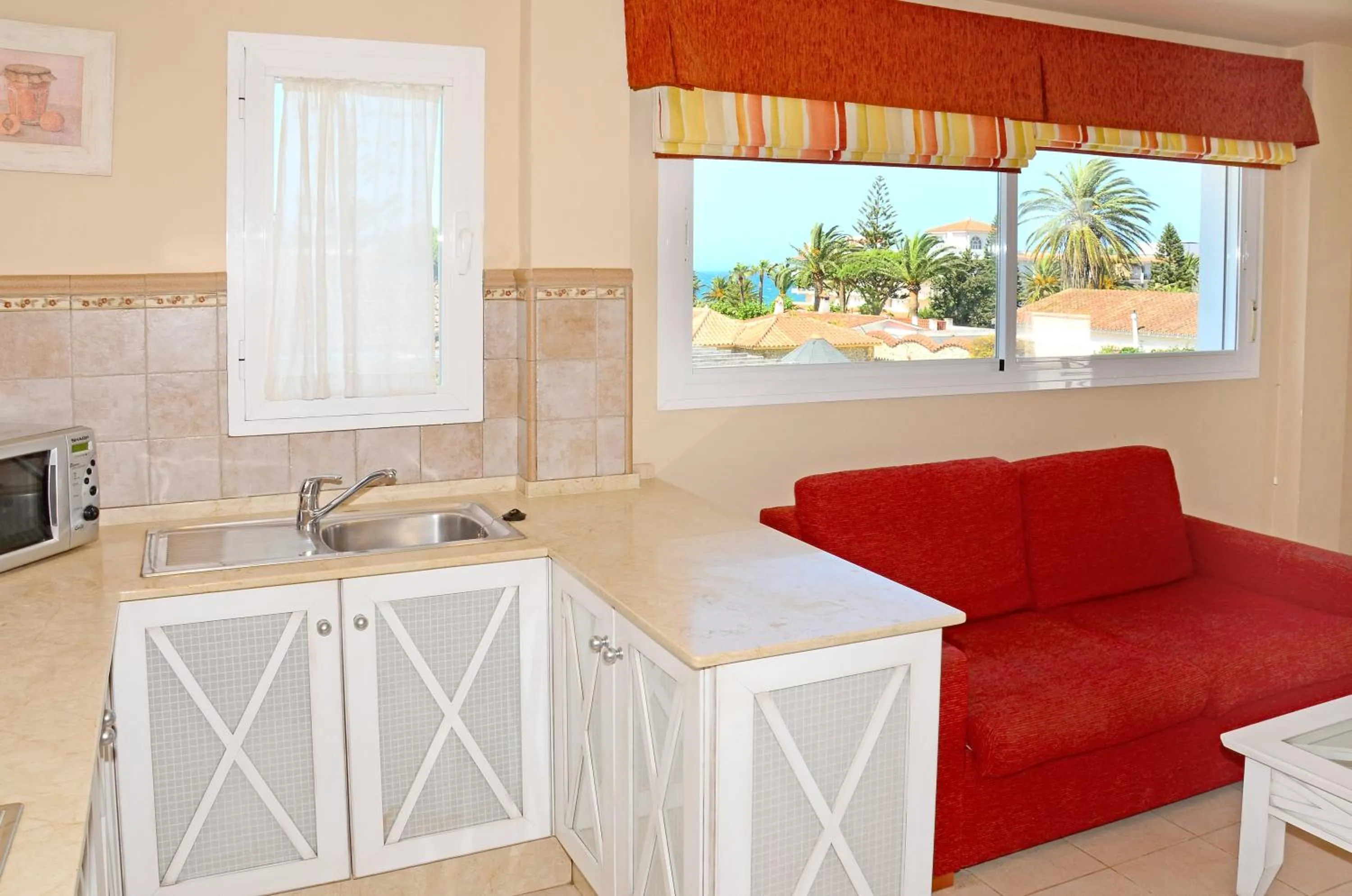 Kitchen or kitchenette in Apartamentos Piedramar