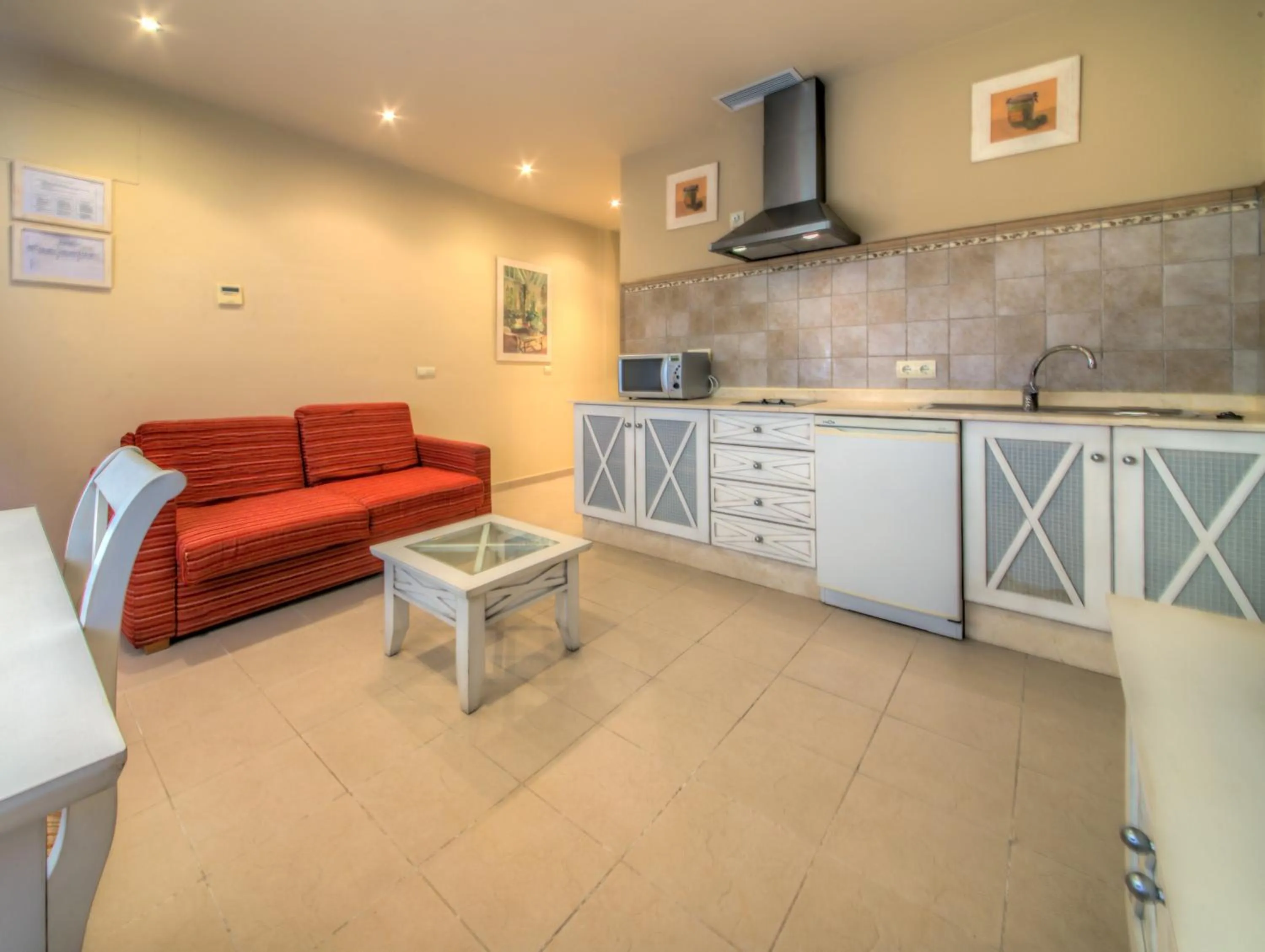 Kitchen or kitchenette in Apartamentos Piedramar