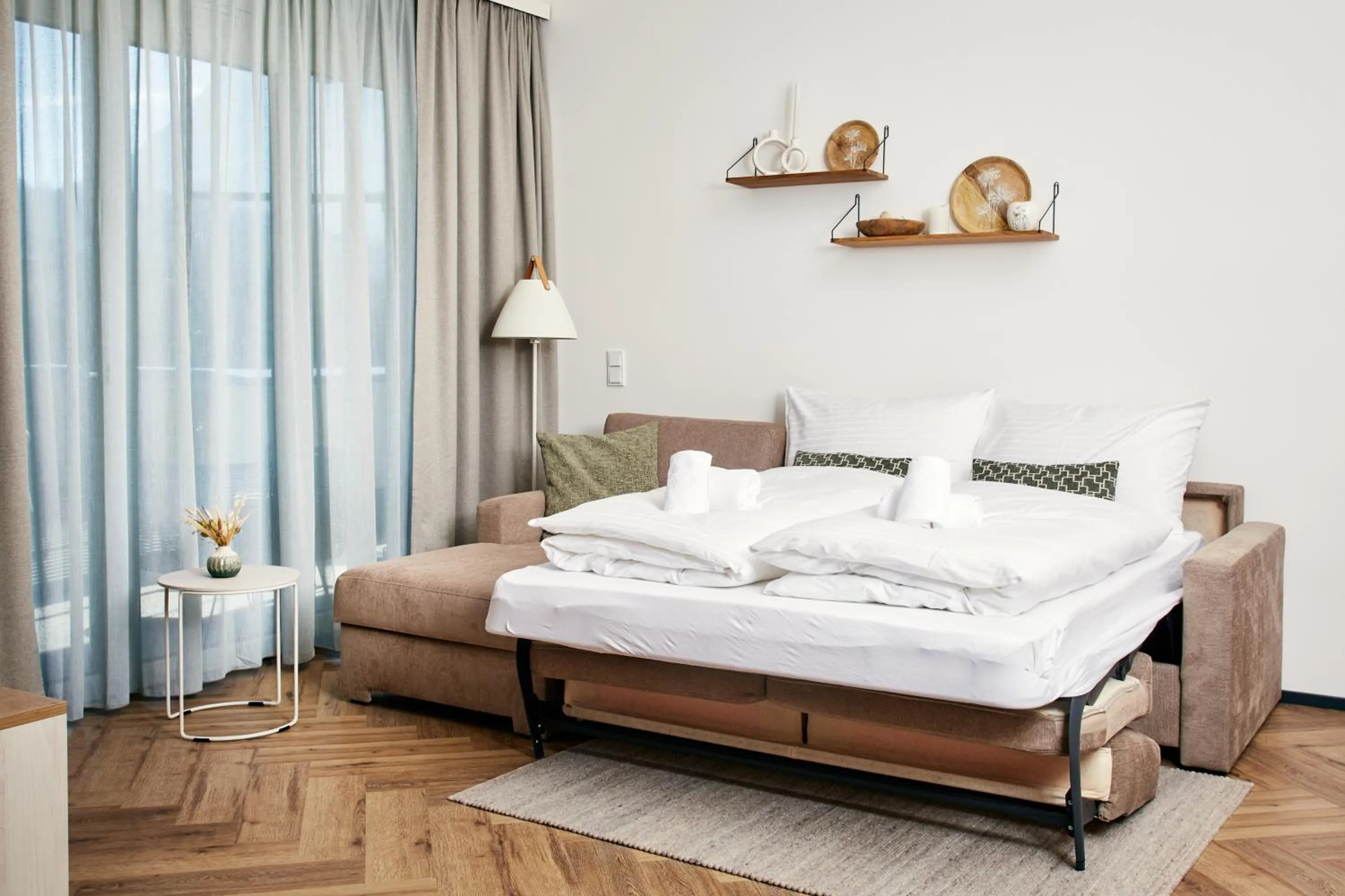 Living room, Bed in HOMEBOUND APARTMENTS Bad Goisern - contactless check-in