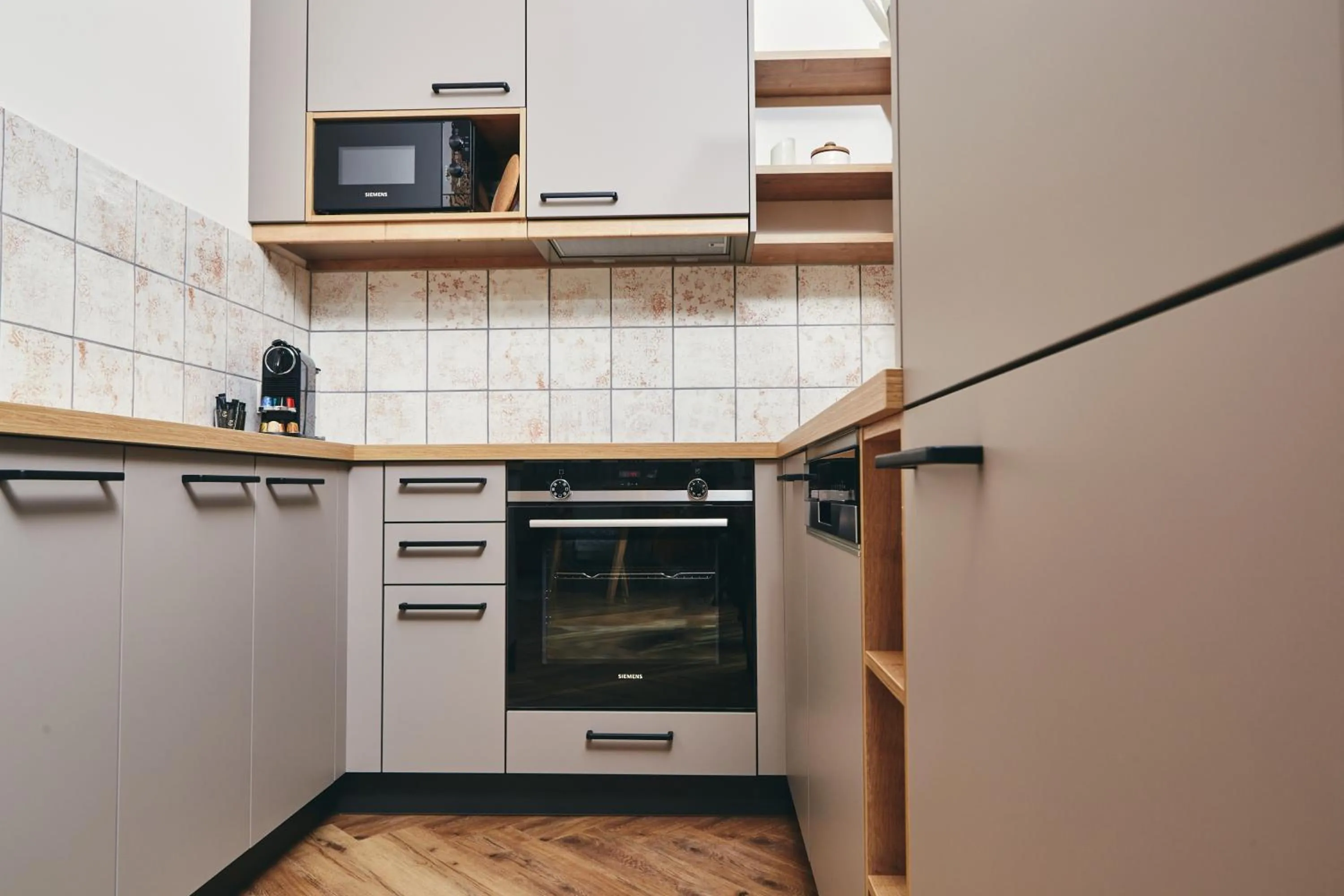 Kitchen or kitchenette in HOMEBOUND APARTMENTS Bad Goisern - contactless check-in