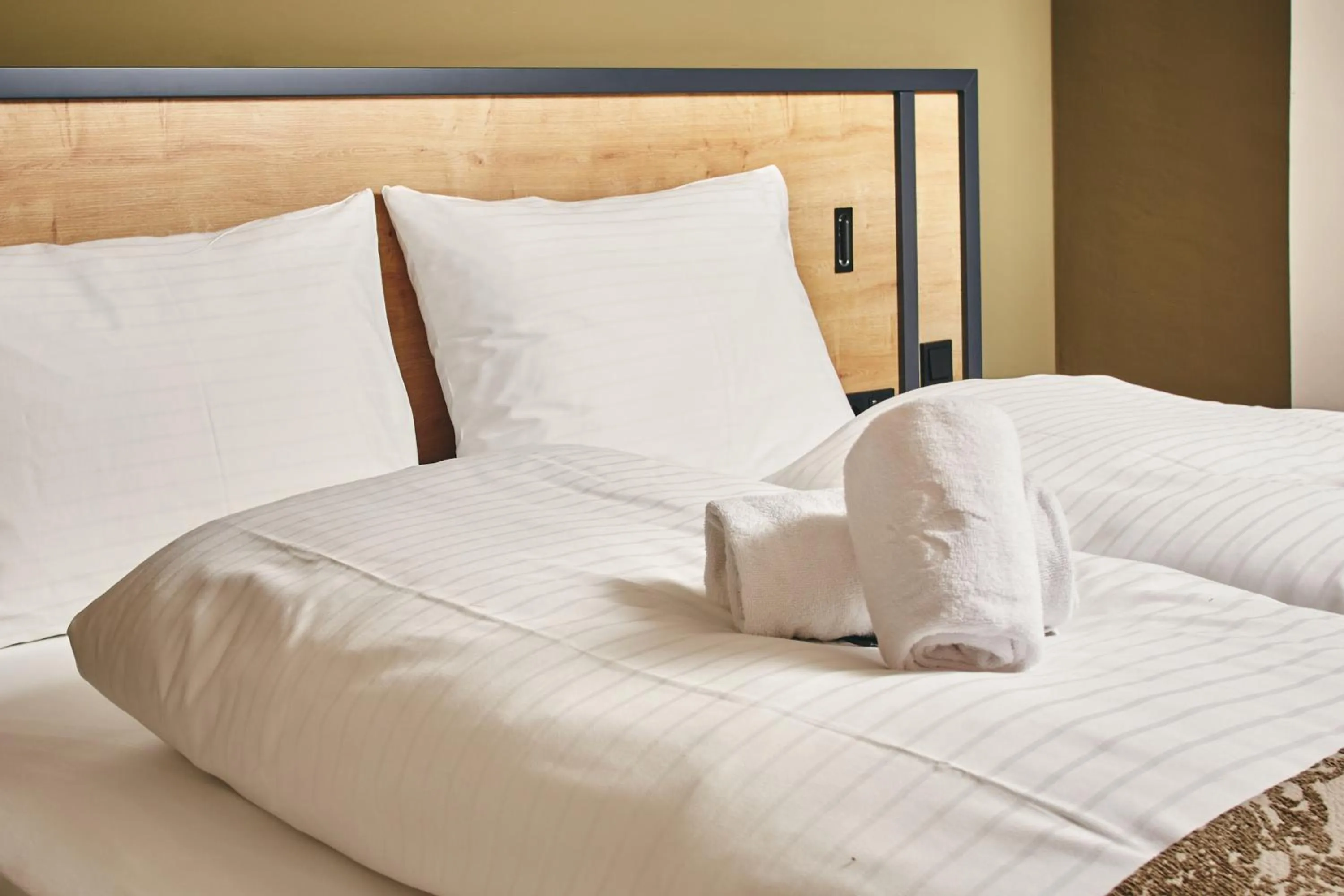 Bed in HOMEBOUND APARTMENTS Bad Goisern - contactless check-in