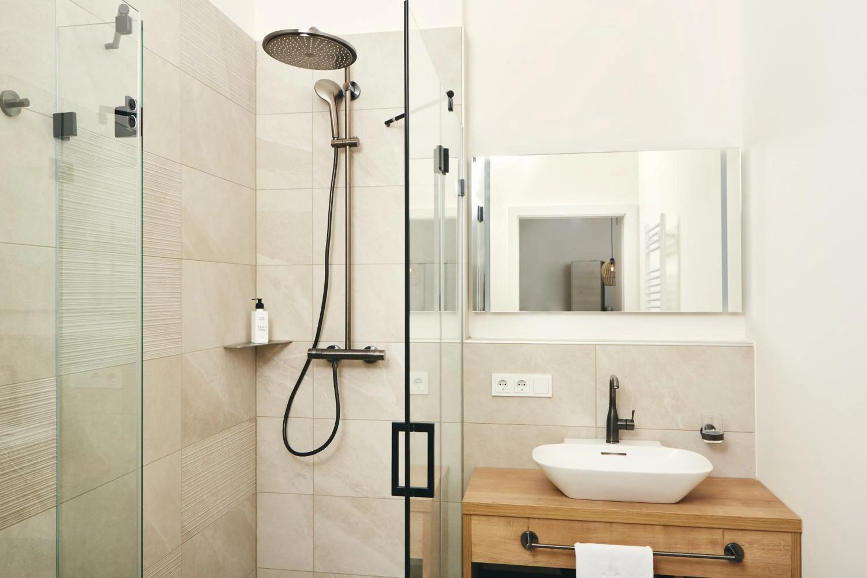 Shower in HOMEBOUND APARTMENTS Bad Goisern - contactless check-in