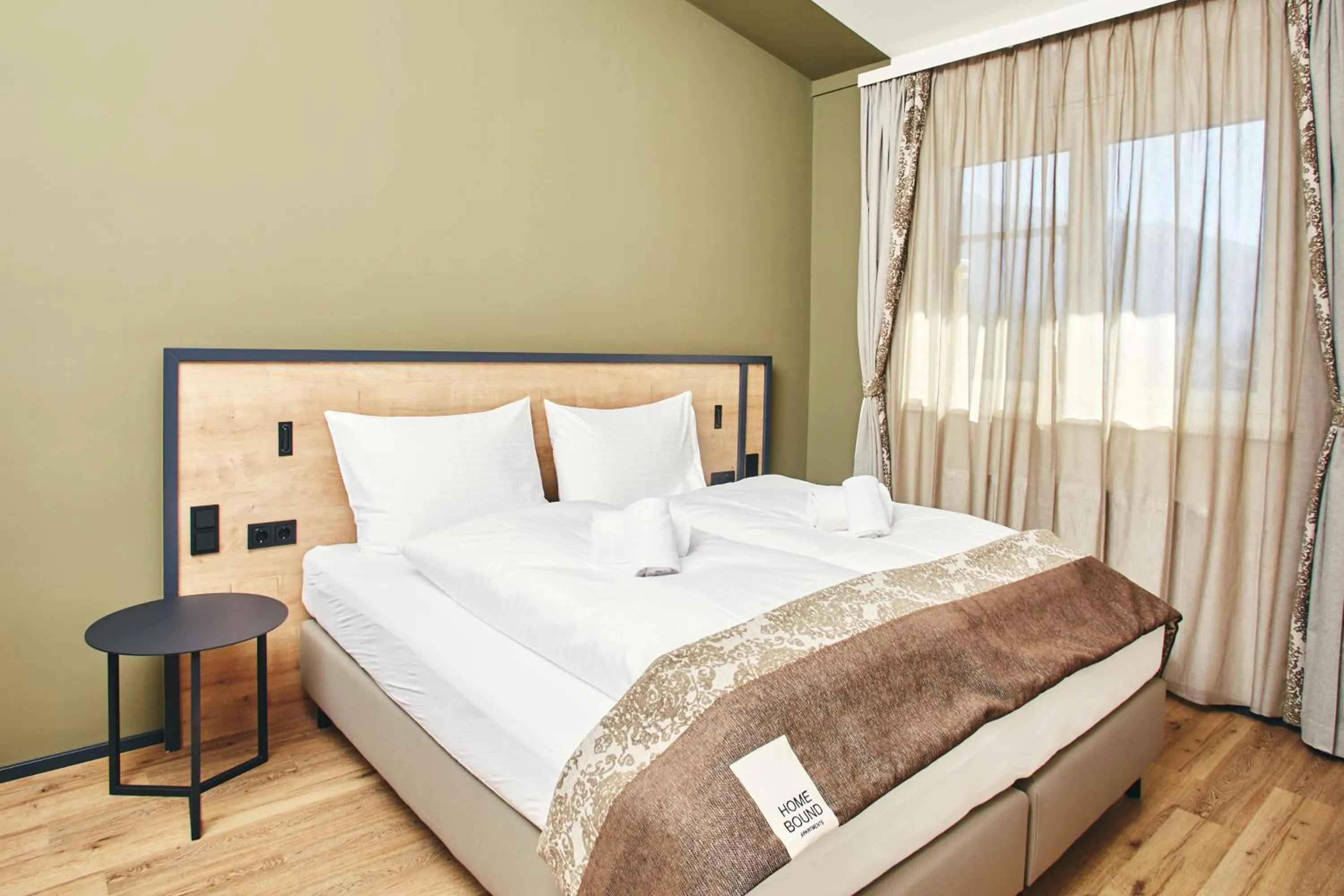 Bed in HOMEBOUND APARTMENTS Bad Goisern - contactless check-in