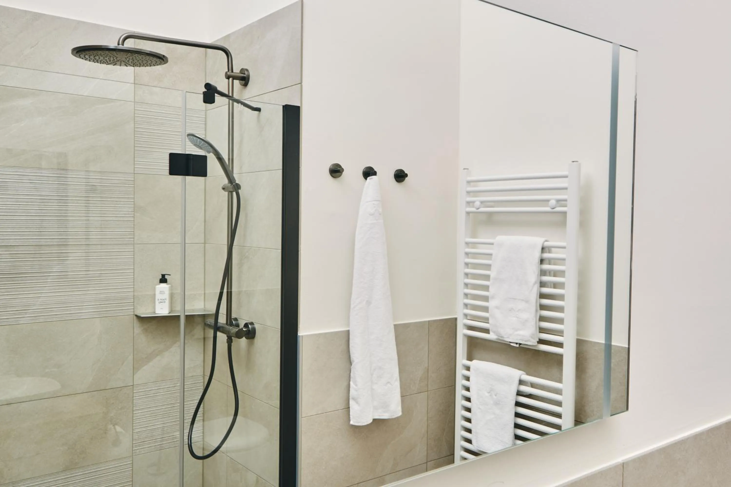 Shower in HOMEBOUND APARTMENTS Bad Goisern - contactless check-in