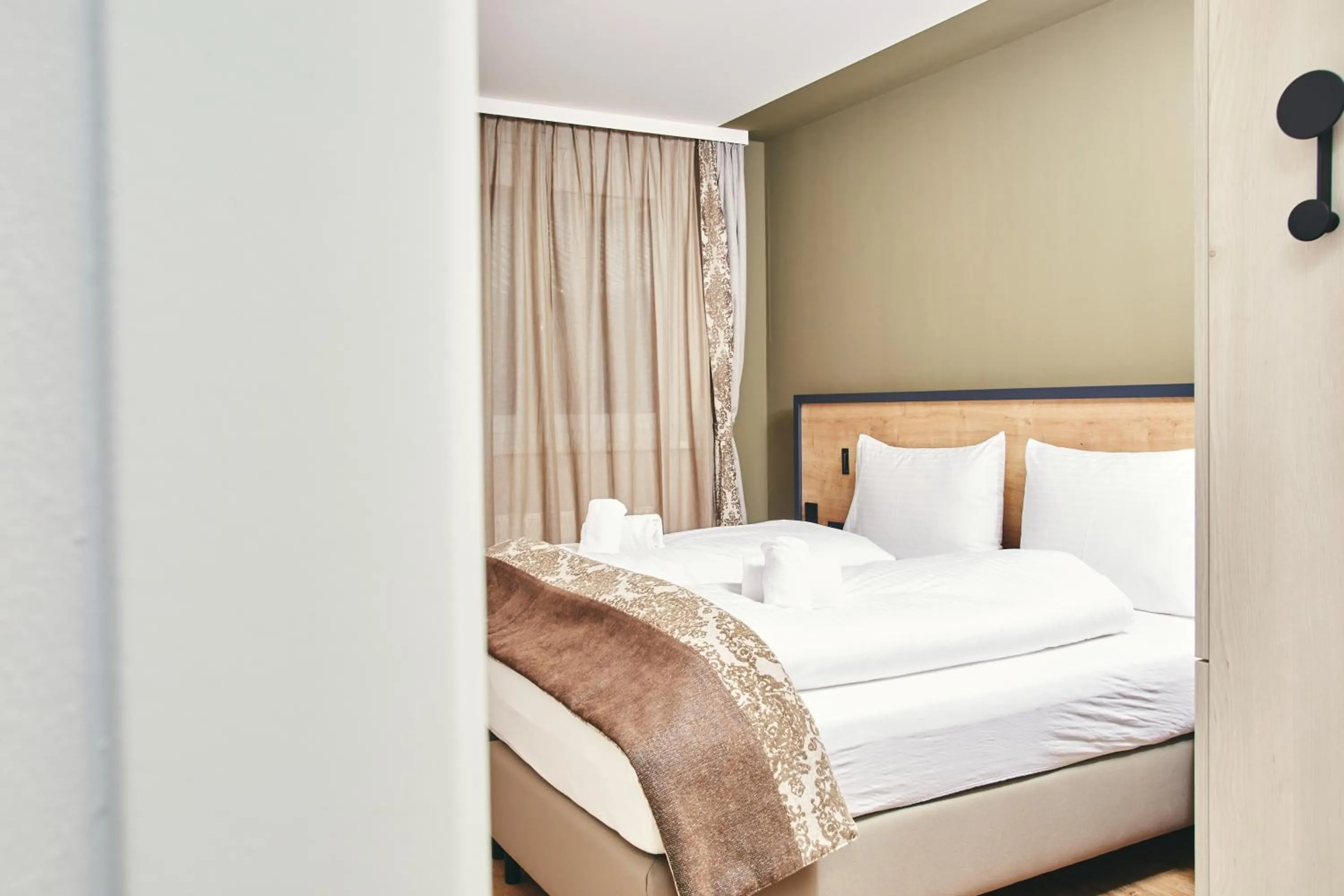 Bedroom, Bed in HOMEBOUND APARTMENTS Bad Goisern - contactless check-in