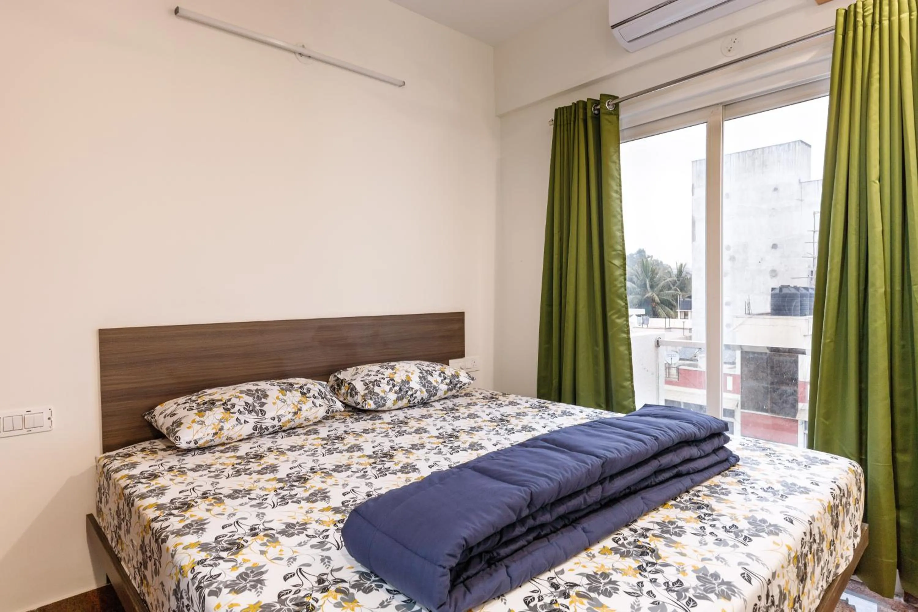 Bed in SPLENDID SHUBHAM SERVICED APARTMENTS