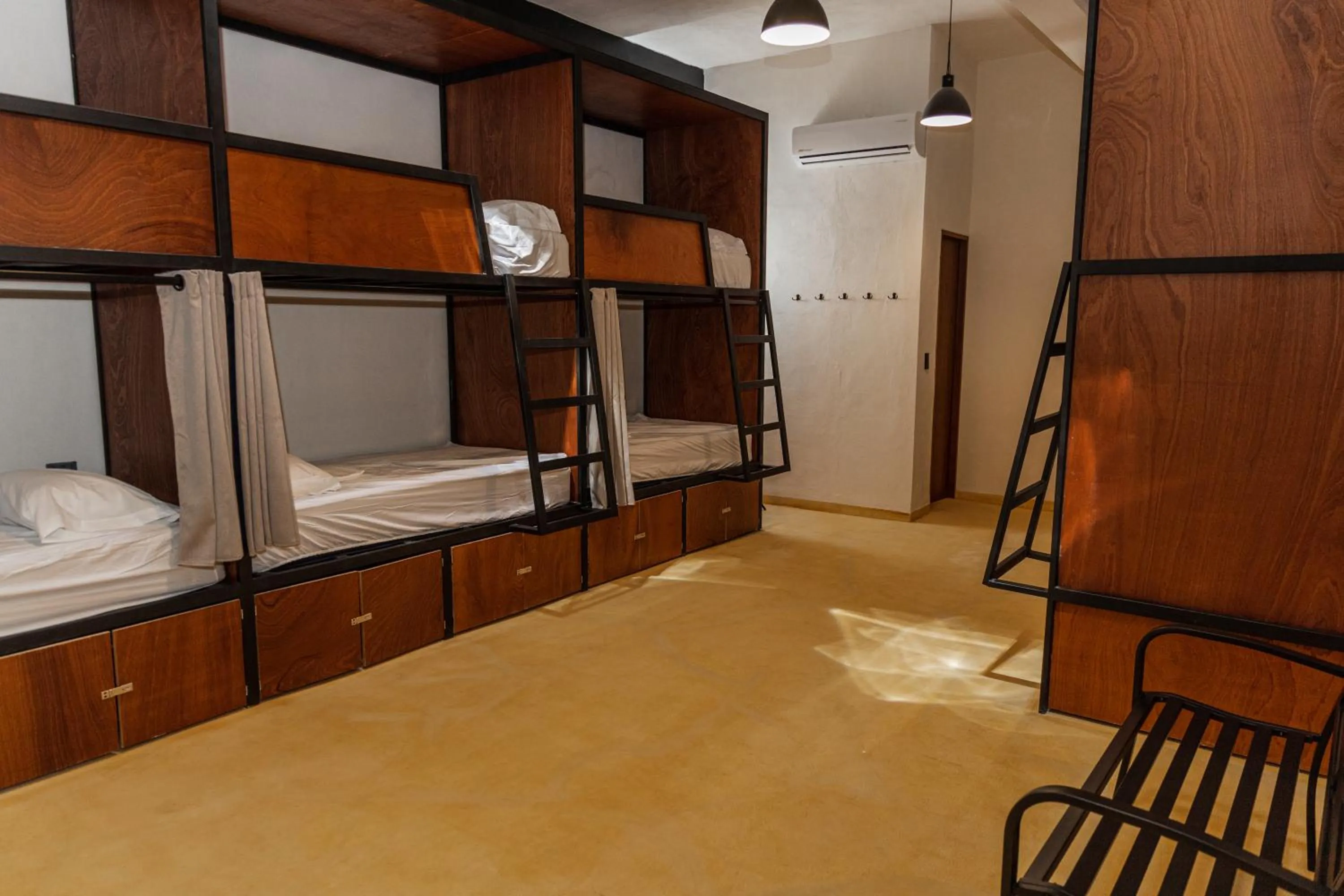 Bedroom in Caleta Hostel Rooftop & Pool