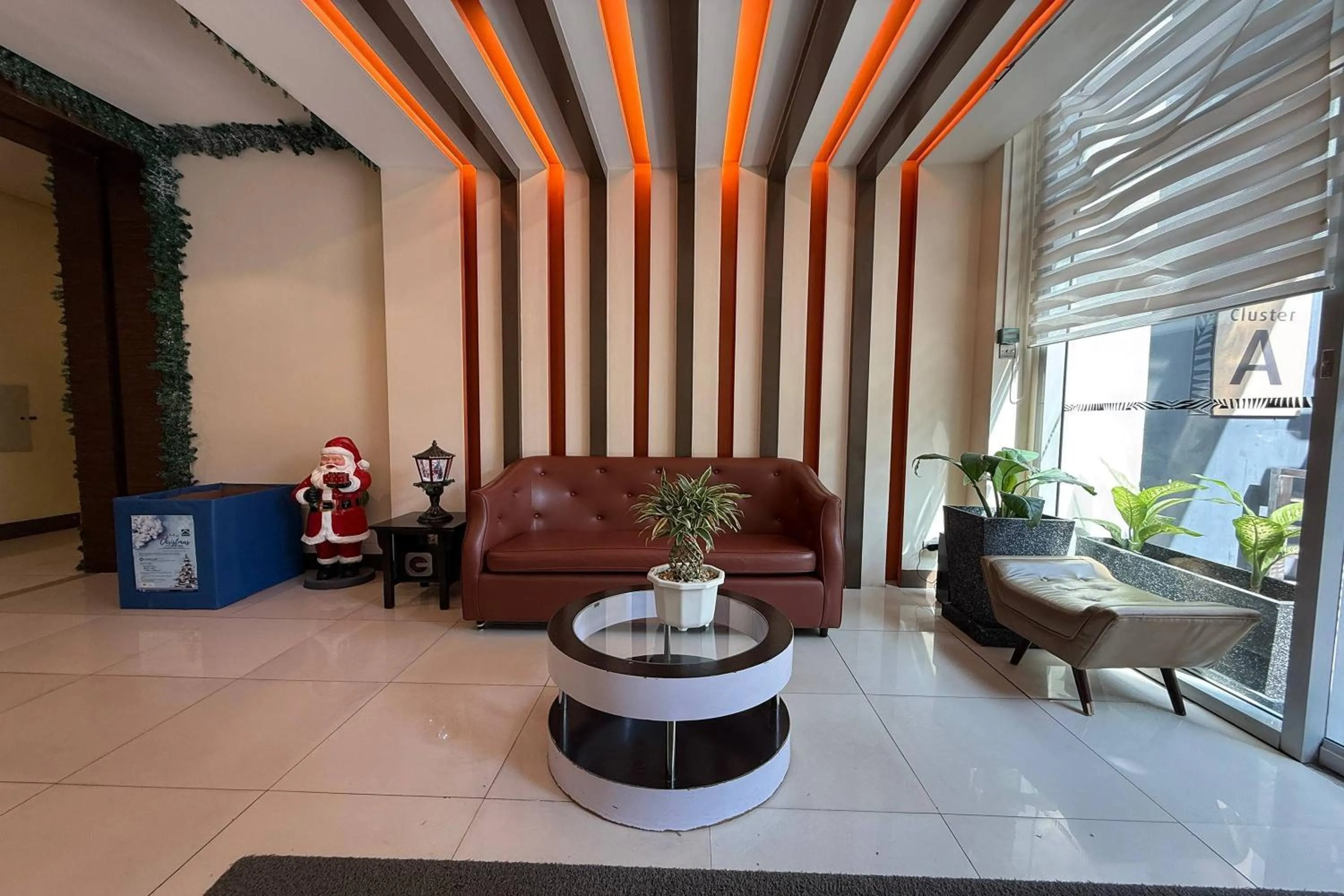 Living room in Del's Condotel across NAIA Terminal 3