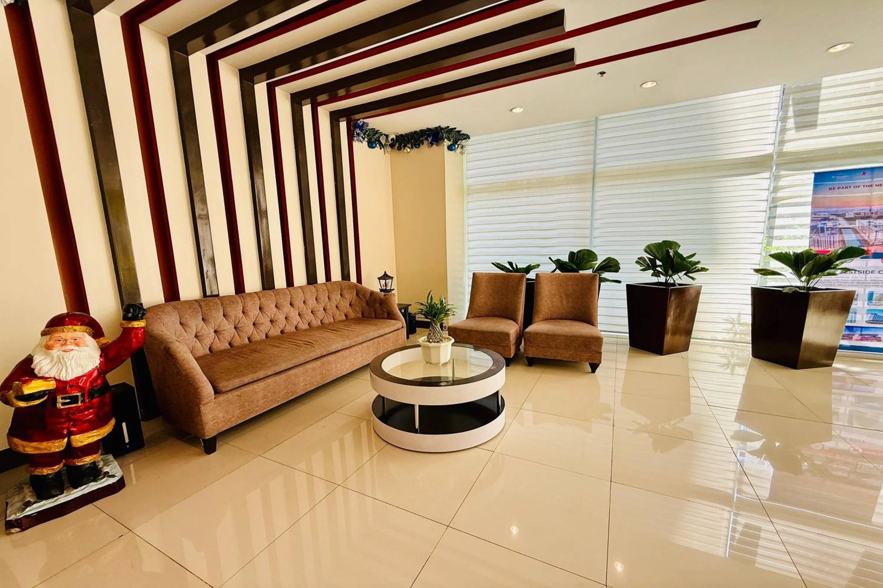 Living room in Del's Condotel across NAIA Terminal 3