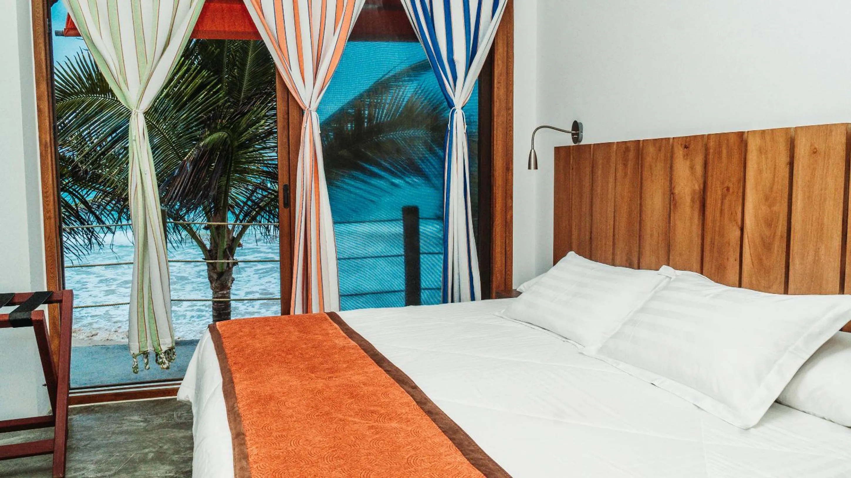 Bed in Mi Playa Galapagos Beachfront Apartments