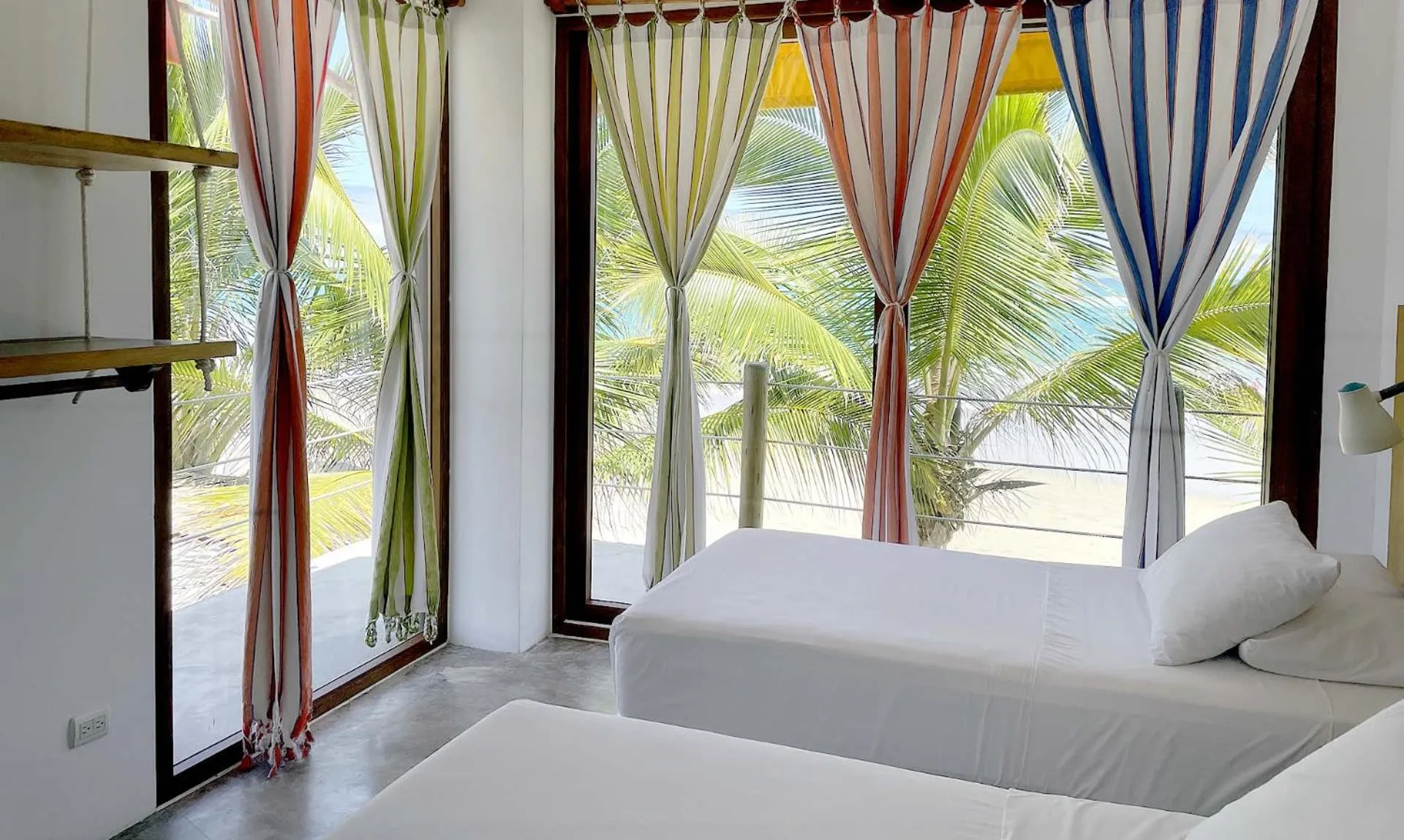 Bed in Mi Playa Galapagos Beachfront Apartments