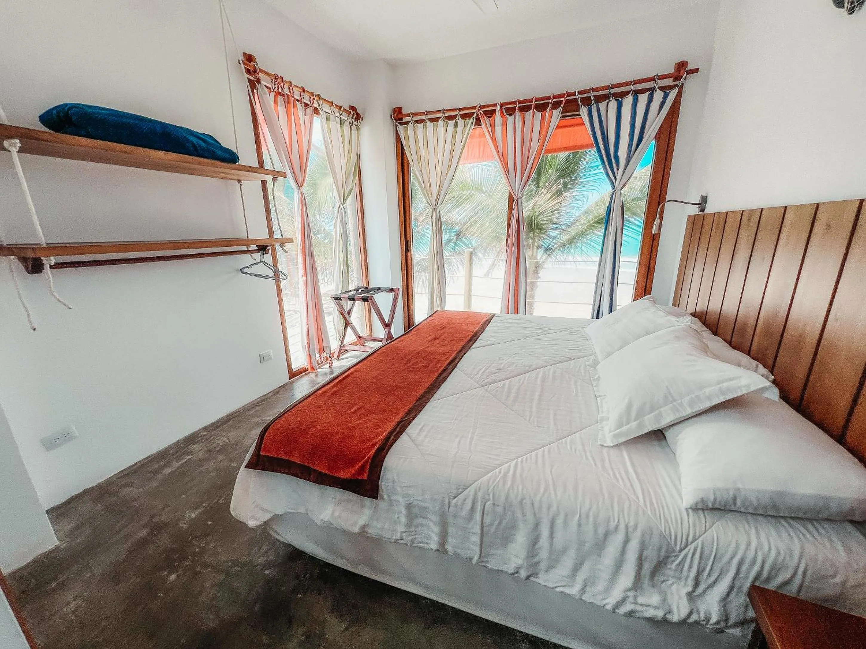 Bed in Mi Playa Galapagos Beachfront Apartments