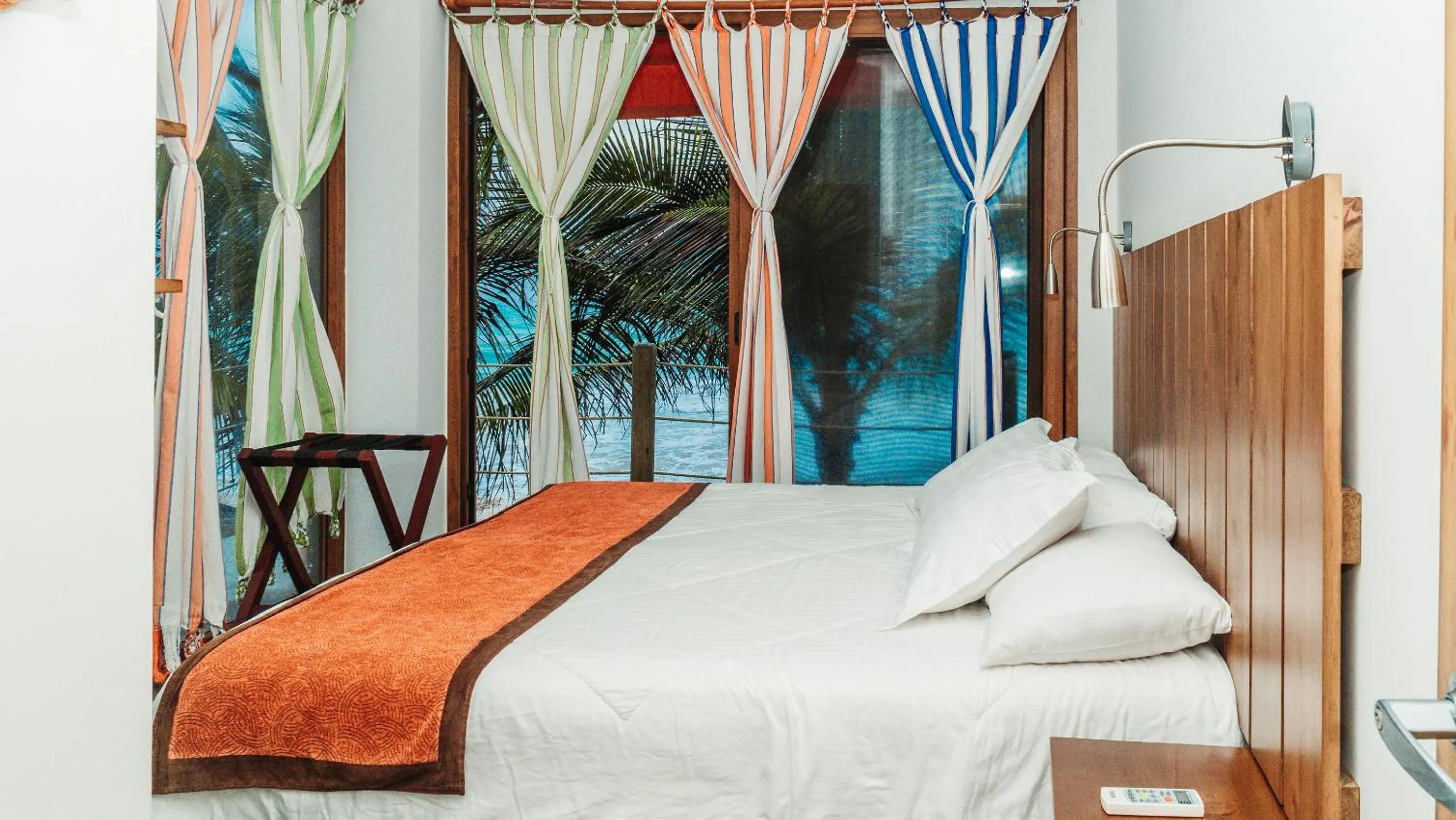 Bed in Mi Playa Galapagos Beachfront Apartments