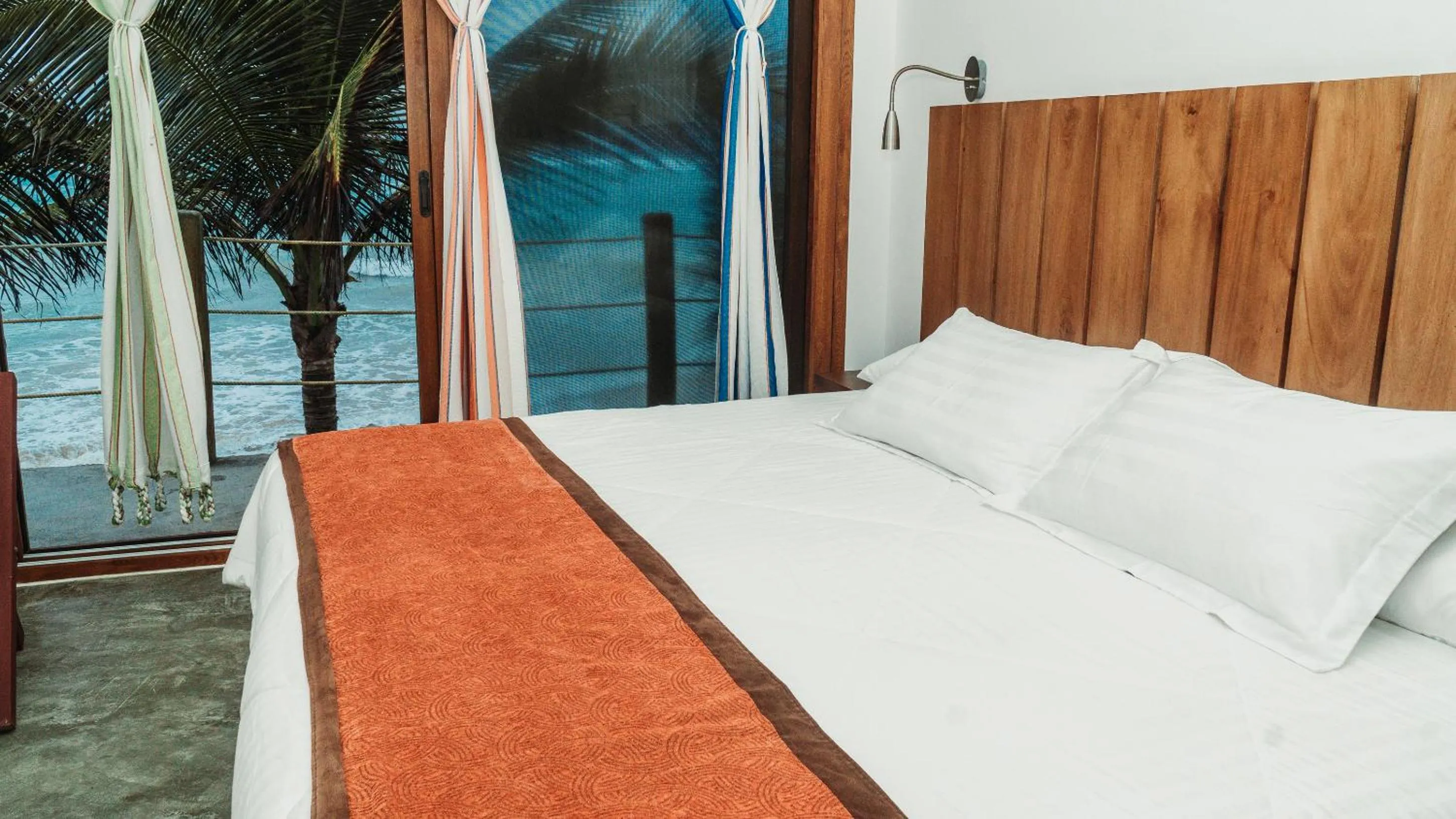 Bed in Mi Playa Galapagos Beachfront Apartments