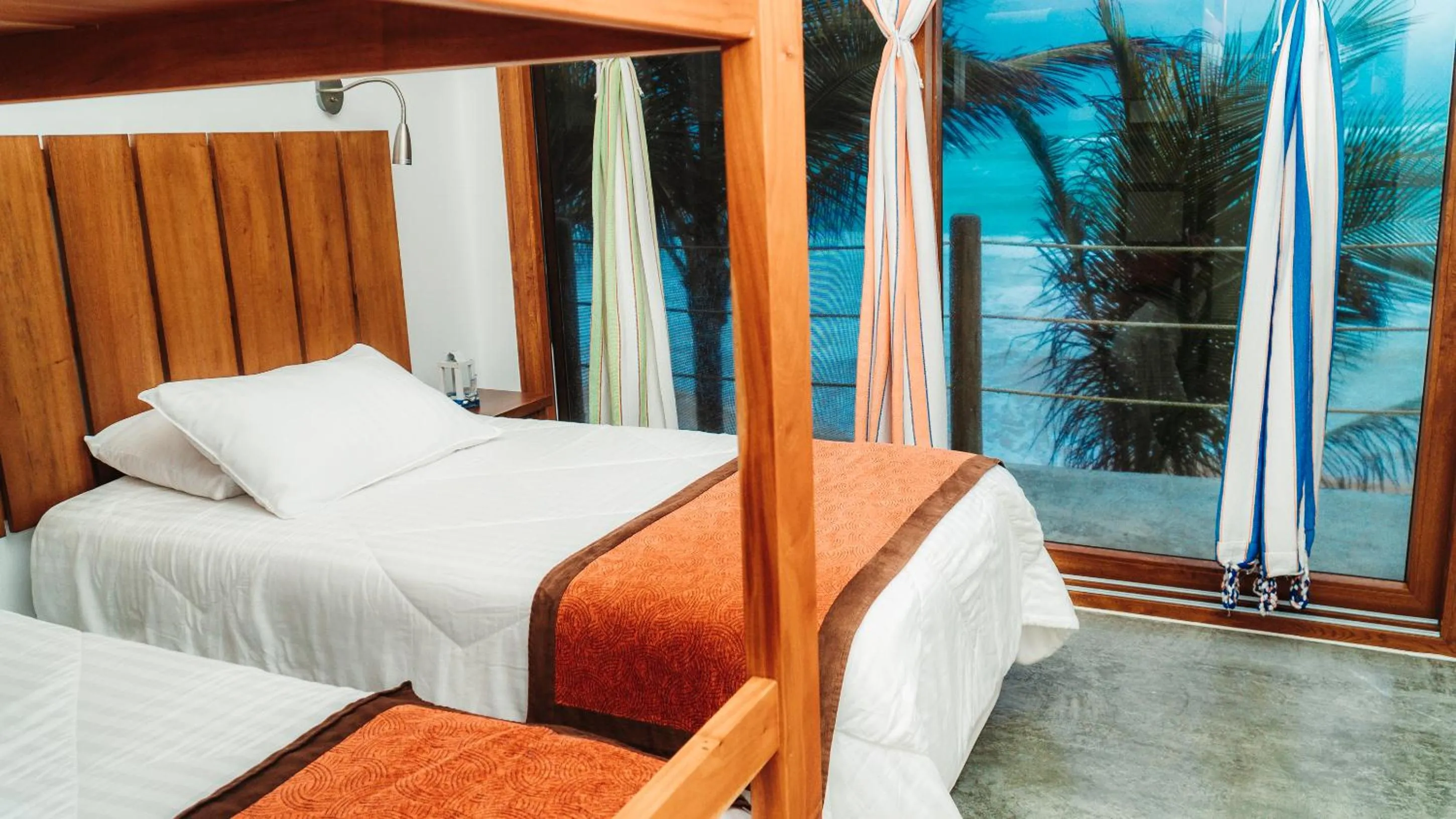 Bed in Mi Playa Galapagos Beachfront Apartments