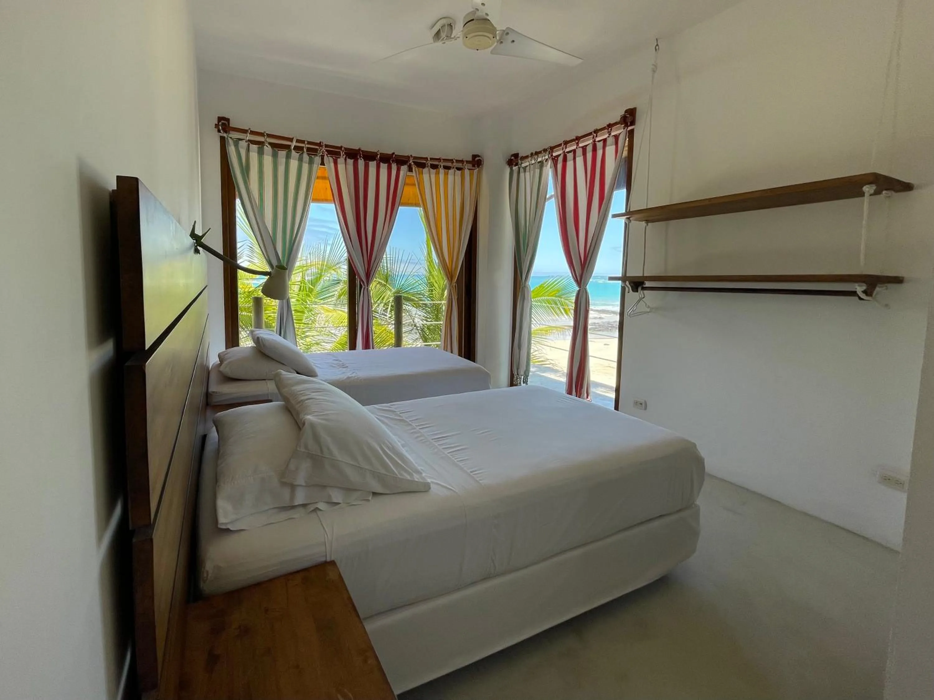 Bed in Mi Playa Galapagos Beachfront Apartments