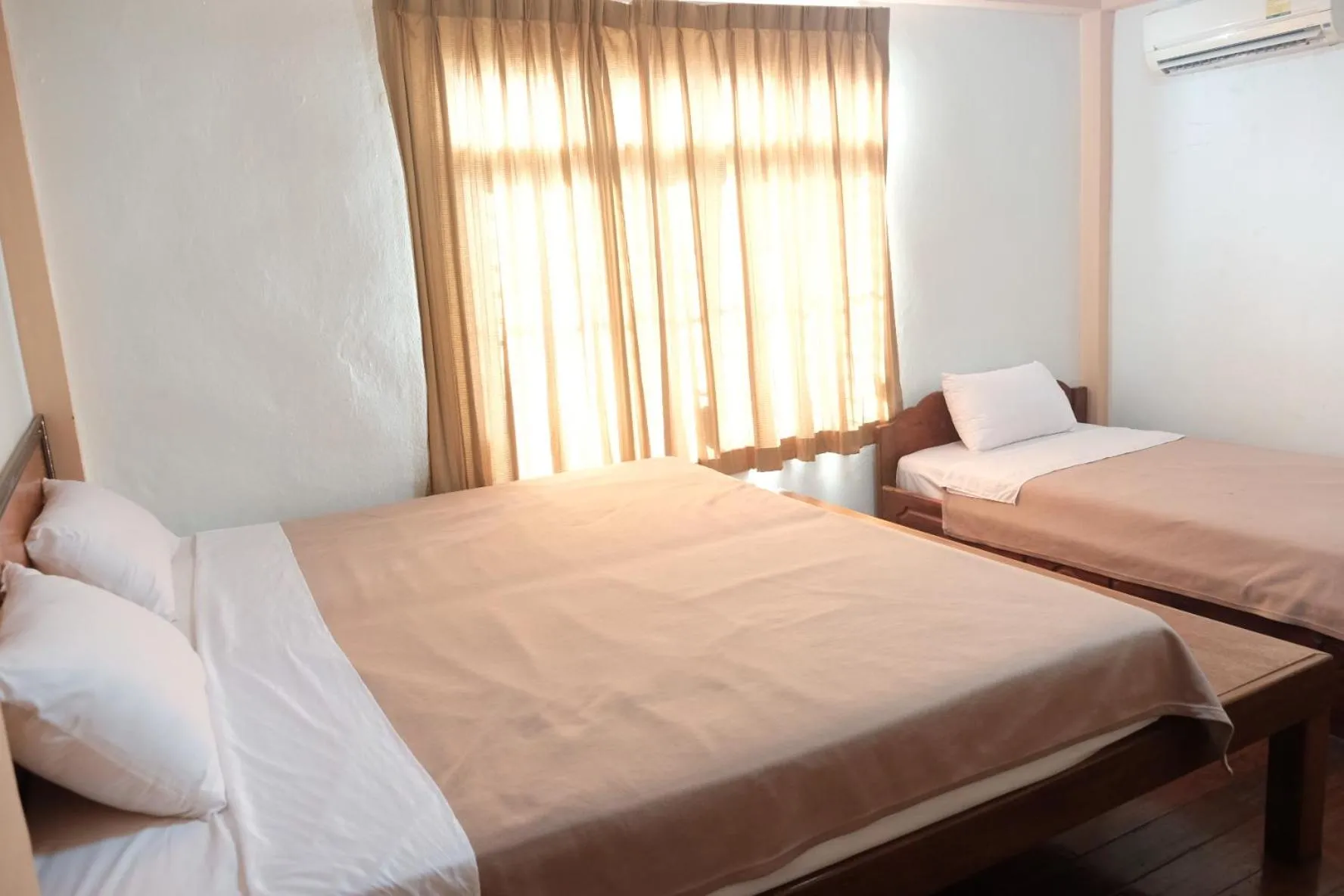 Bed in Manilath guesthouse