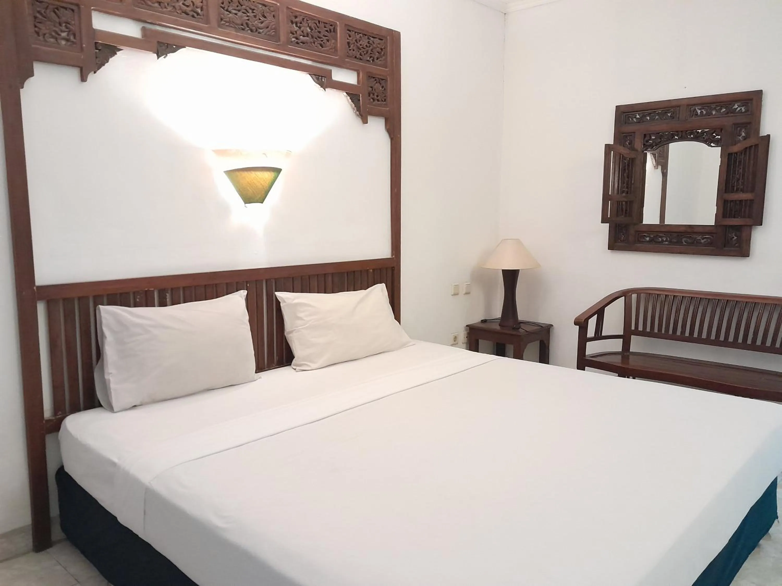 Bedroom in The Green Winotosastro Hotel Yogyakarta