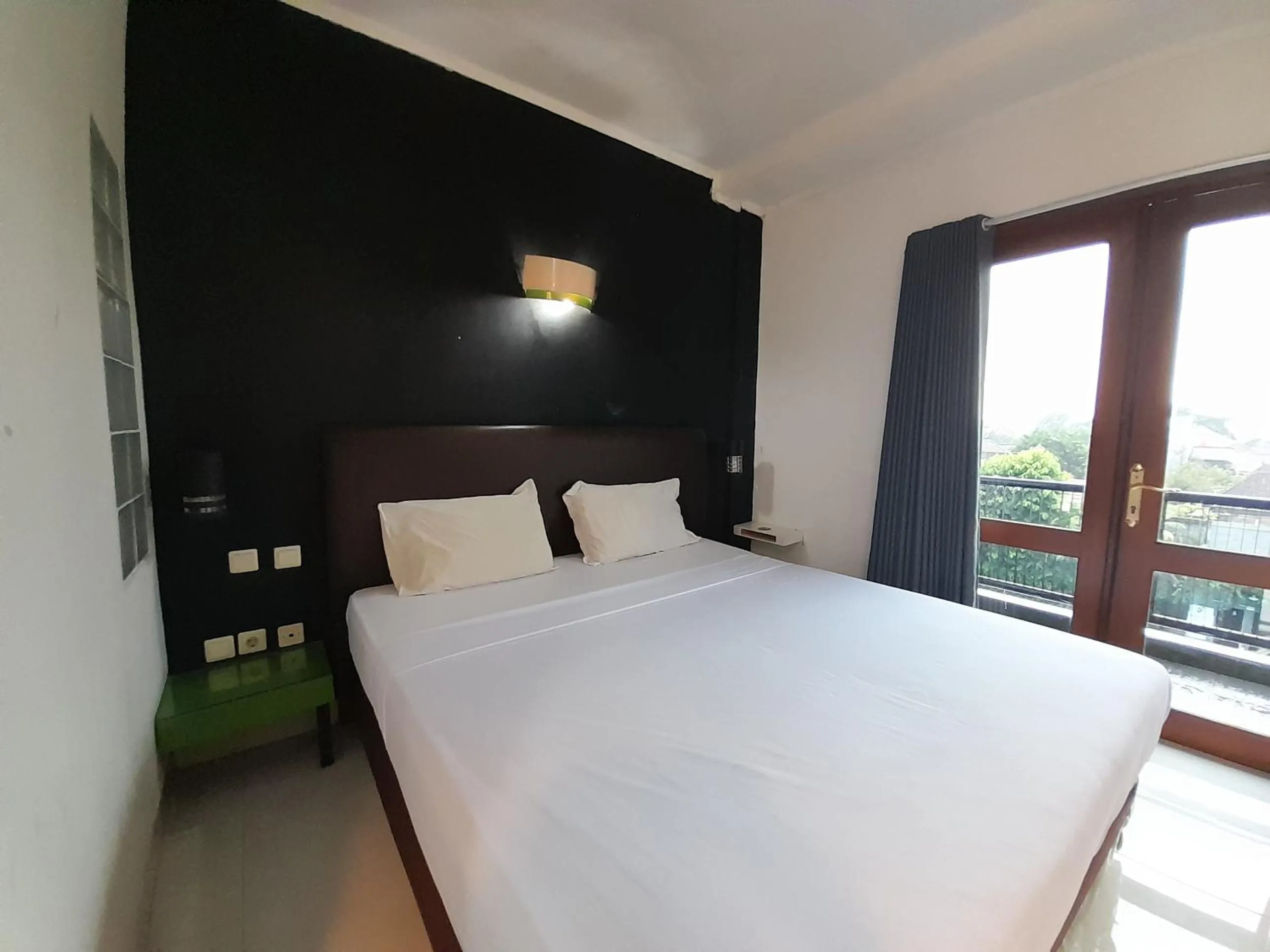 Bedroom in The Green Winotosastro Hotel Yogyakarta