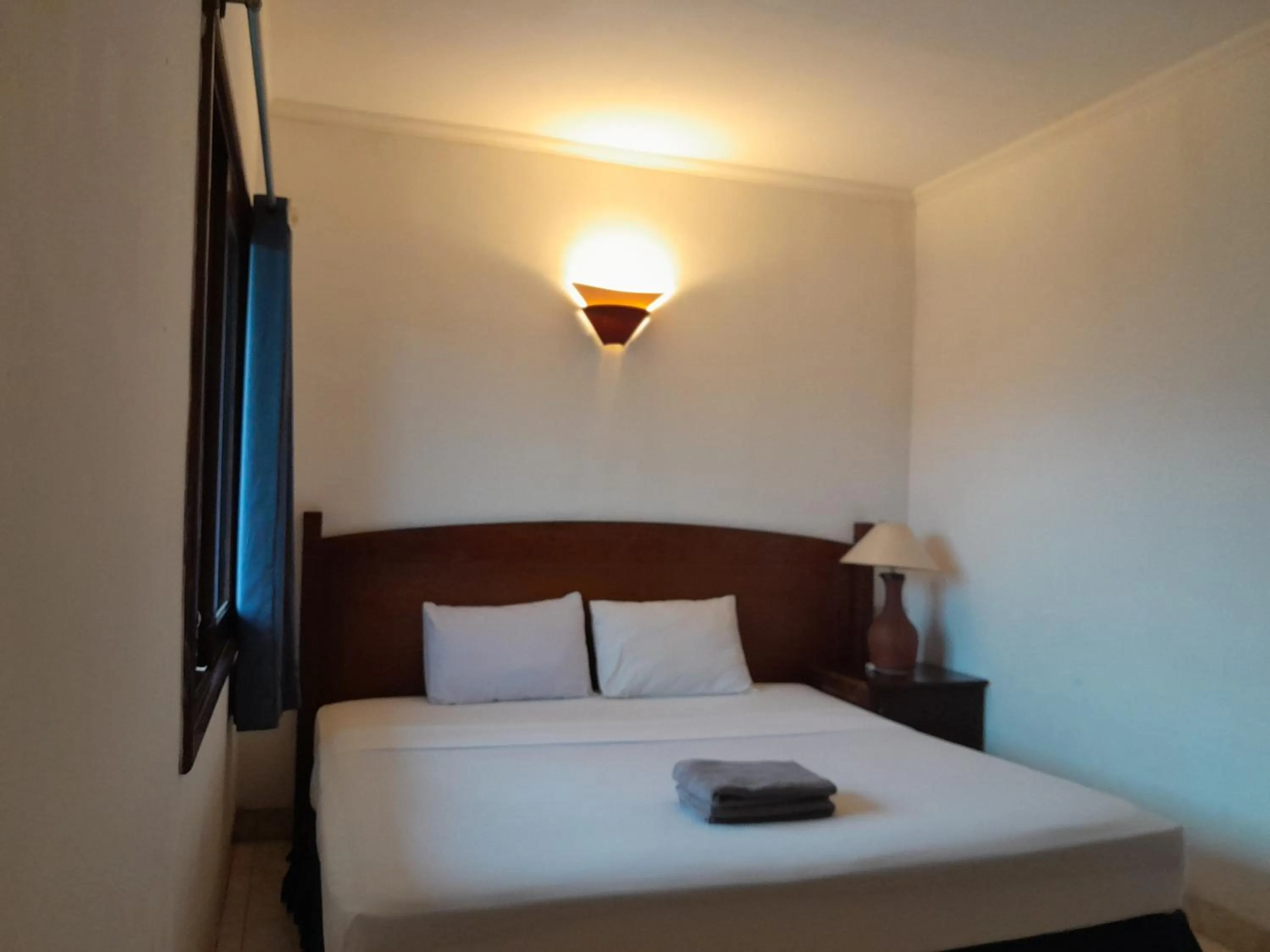 Bedroom in The Green Winotosastro Hotel Yogyakarta