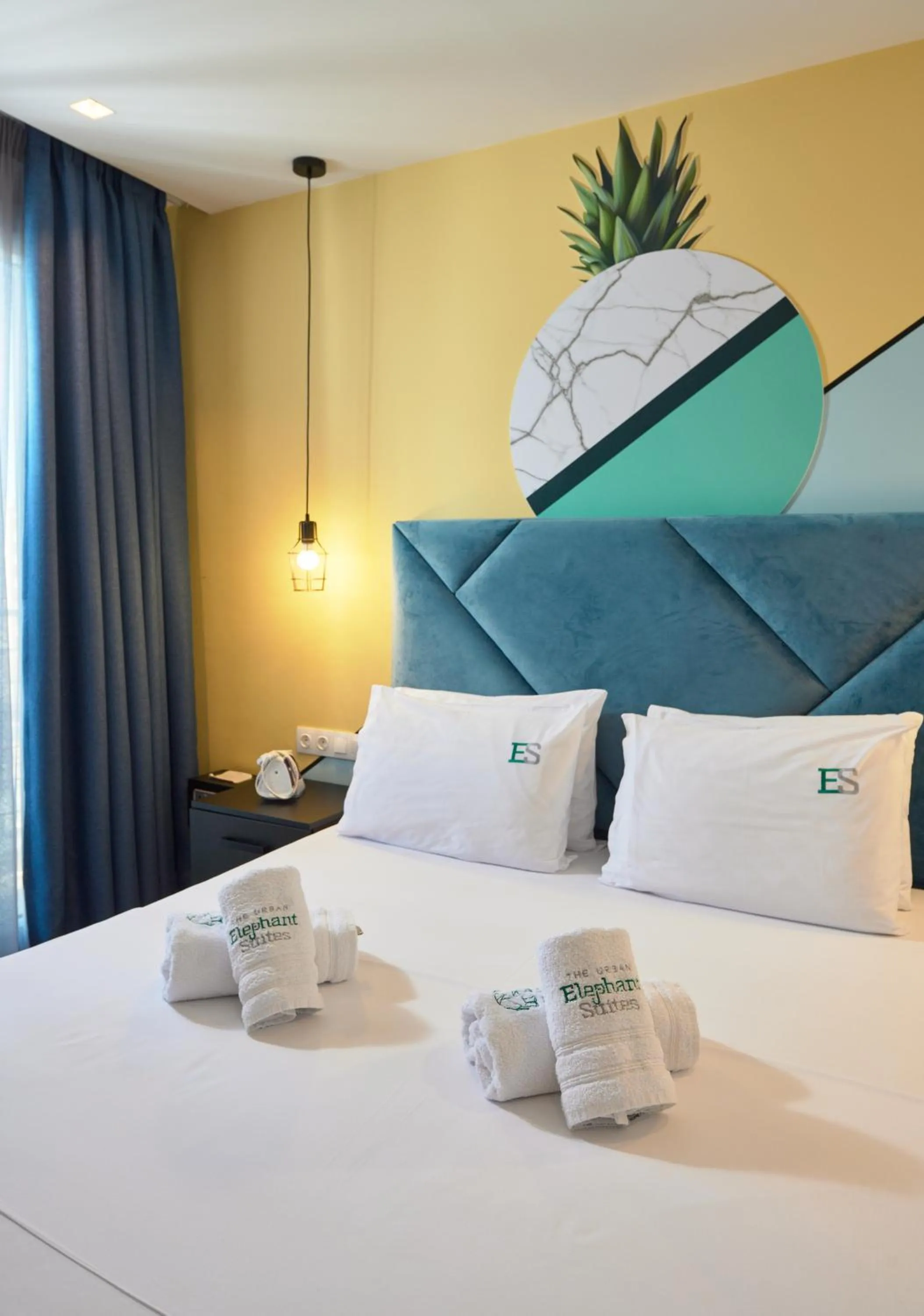 Bed in Urban Elephant Suites