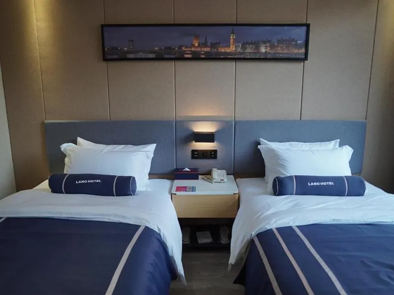 Bed in LanOu Hotel Yancheng Dafeng Yongtai Plaza