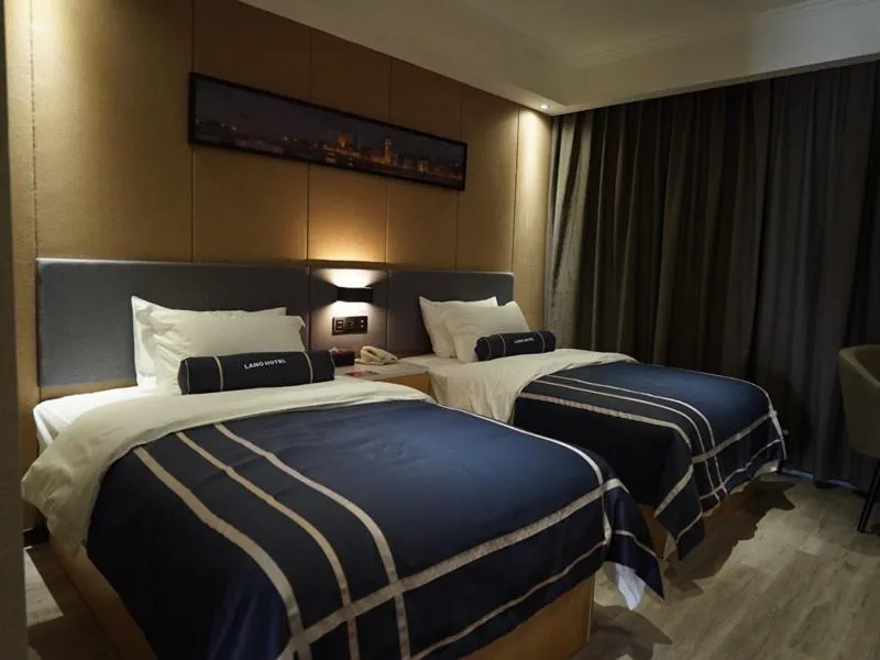 Bed in LanOu Hotel Yancheng Dafeng Yongtai Plaza