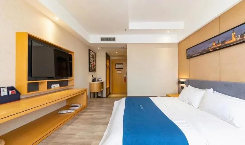 Bed in LanOu Hotel Yancheng Dafeng Yongtai Plaza