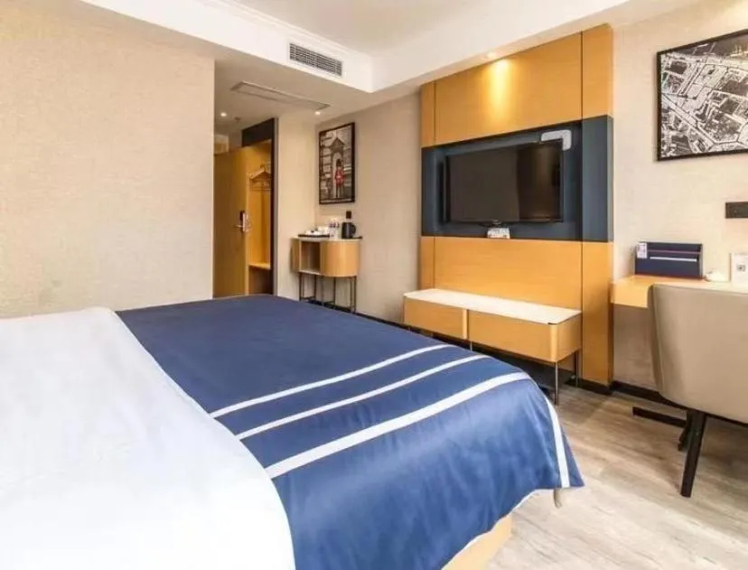 Bed in LanOu Hotel Yancheng Dafeng Yongtai Plaza