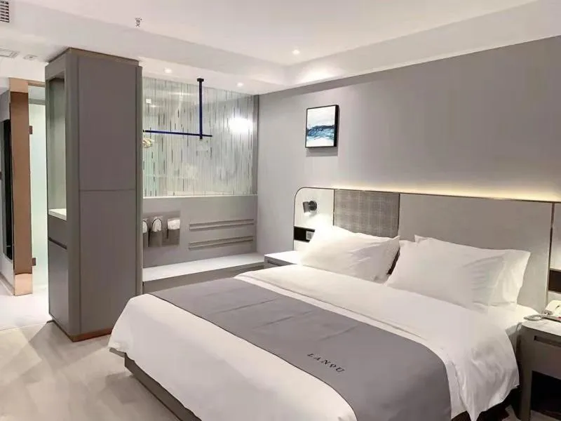 Bed in LanOu Hotel Yancheng Dafeng Yongtai Plaza