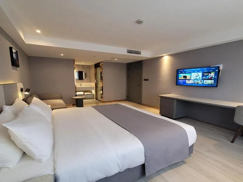 Bed in LanOu Hotel Yancheng Dafeng Yongtai Plaza