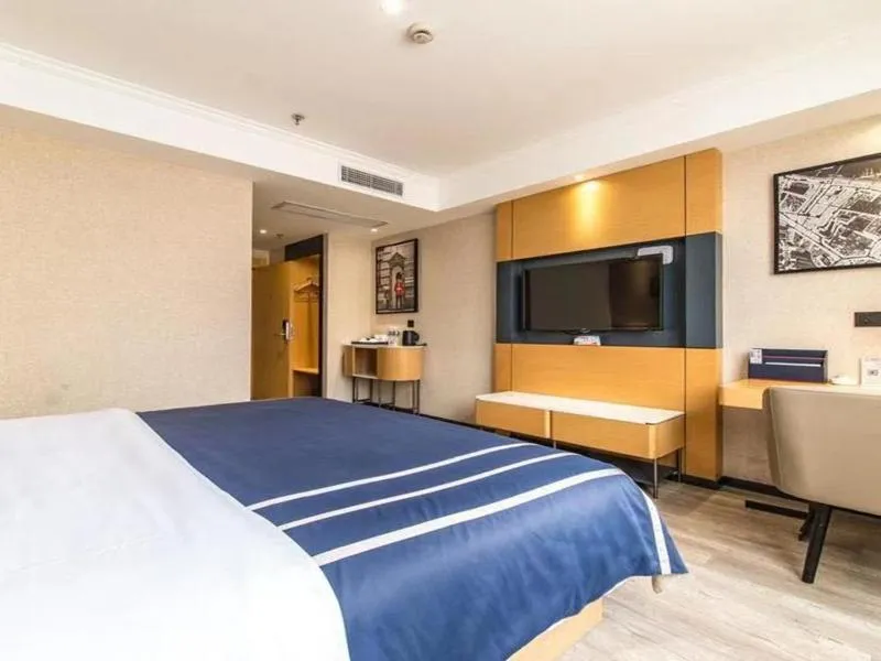 Bed in LanOu Hotel Yancheng Dafeng Yongtai Plaza