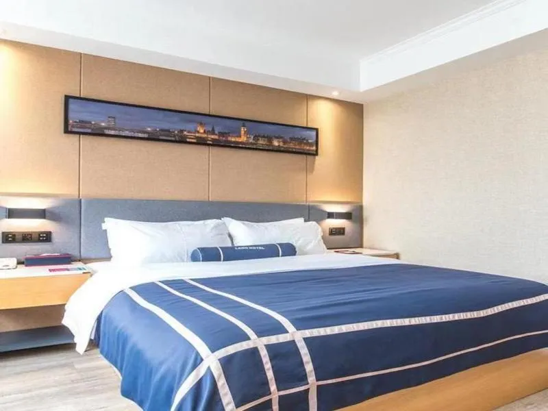 Bed in LanOu Hotel Yancheng Dafeng Yongtai Plaza