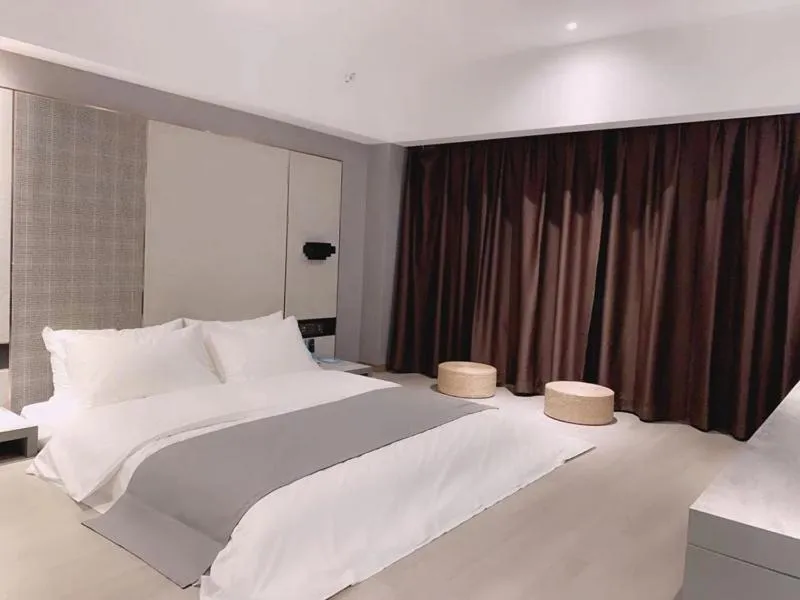 Bed in LanOu Hotel Yancheng Dafeng Yongtai Plaza
