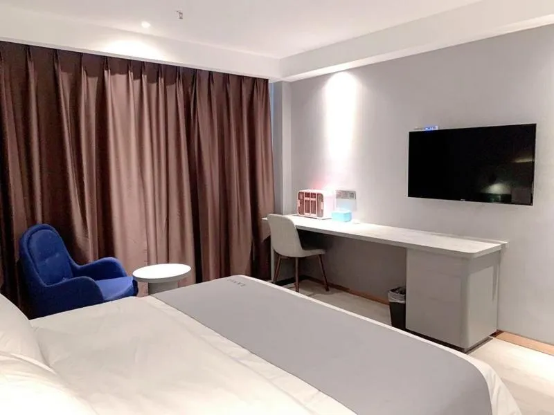 Bed in LanOu Hotel Yancheng Dafeng Yongtai Plaza