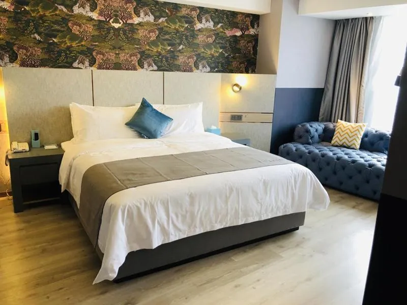 Bed in LanOu Hotel Zhenjiang Runzhou District Railway Station