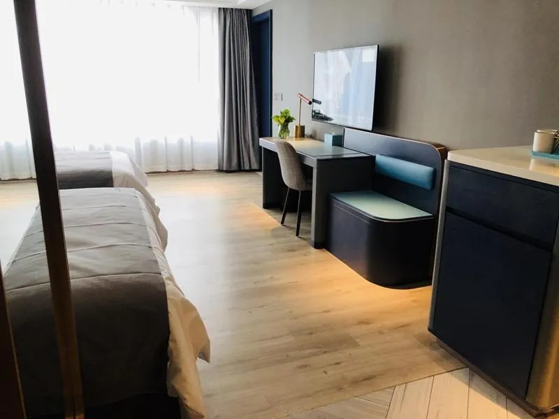 Bed in LanOu Hotel Zhenjiang Runzhou District Railway Station