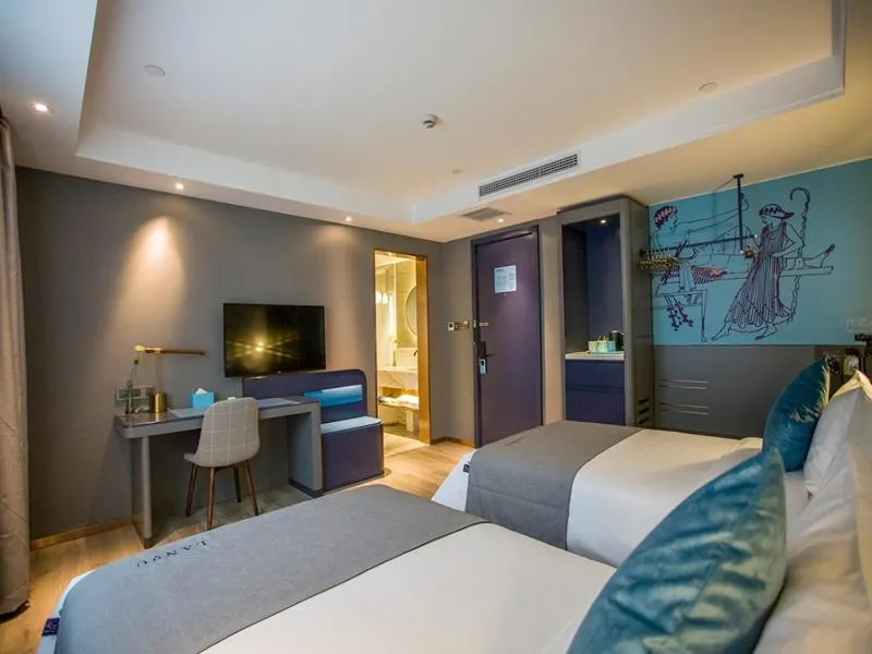 Bed in LanOu Hotel Zhenjiang Runzhou District Railway Station