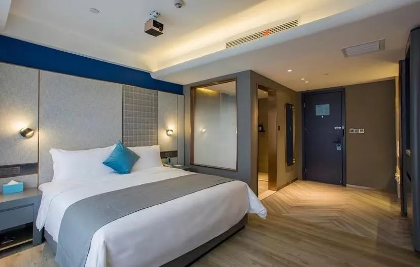 Bed in LanOu Hotel Zhenjiang Runzhou District Railway Station