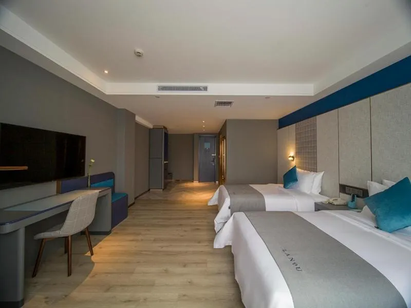 Bed in LanOu Hotel Zhenjiang Runzhou District Railway Station