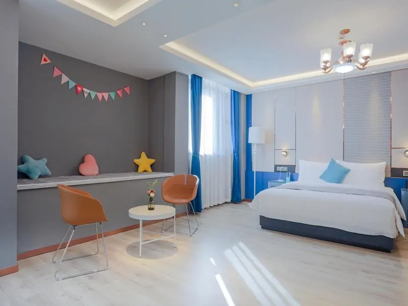 Bed in LanOu Hotel Taixing Wanda Plaza