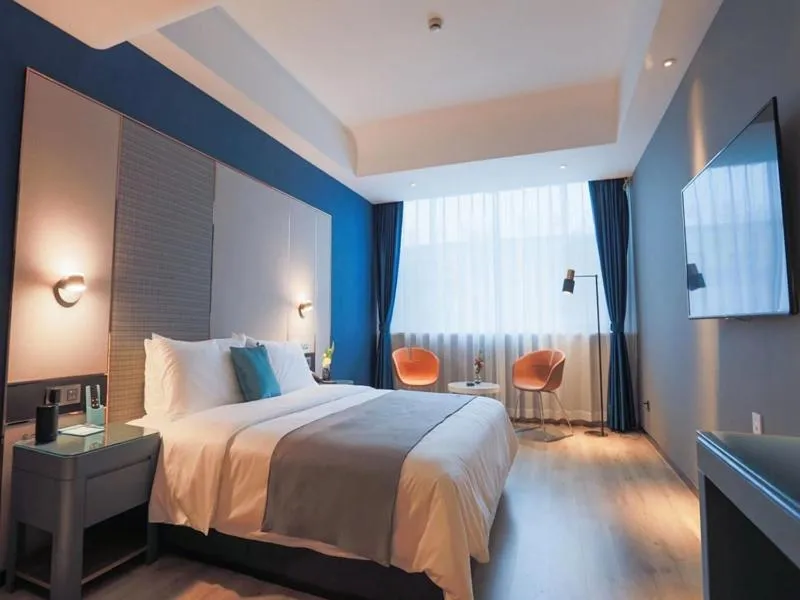 Bed in LanOu Hotel Taixing Wanda Plaza