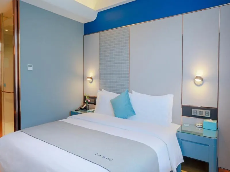 Bed in LanOu Hotel Taixing Wanda Plaza