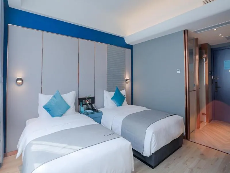 Bed in LanOu Hotel Taixing Wanda Plaza