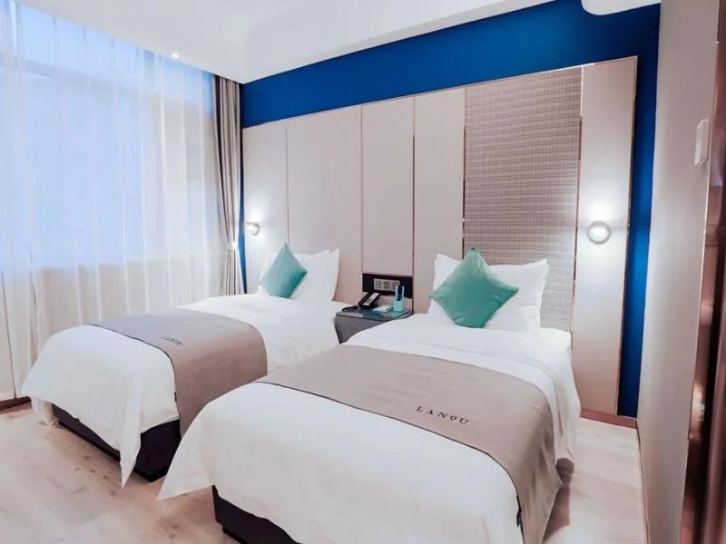 Bed in LanOu Hotel Taixing Wanda Plaza