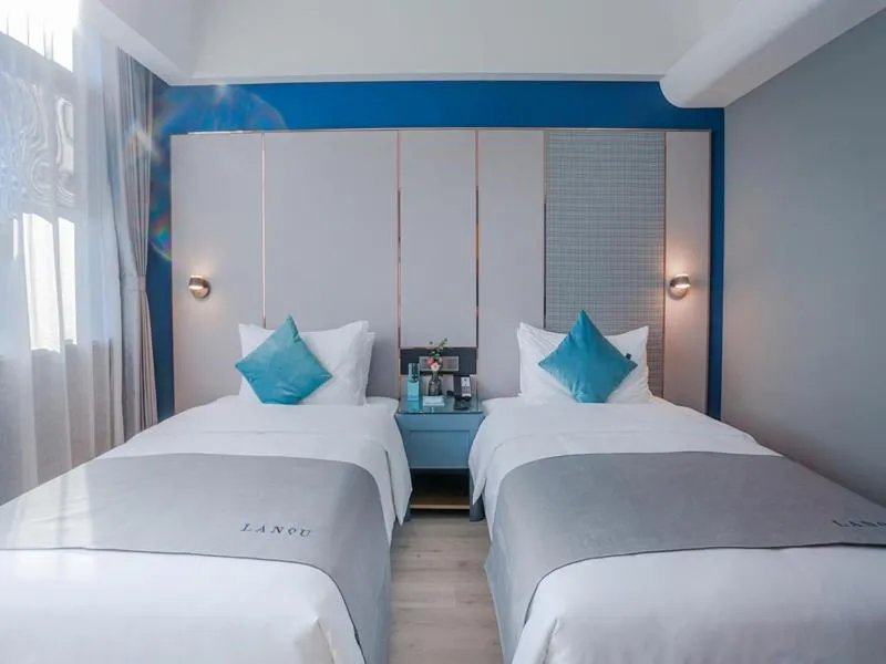 Bed in LanOu Hotel Taixing Wanda Plaza