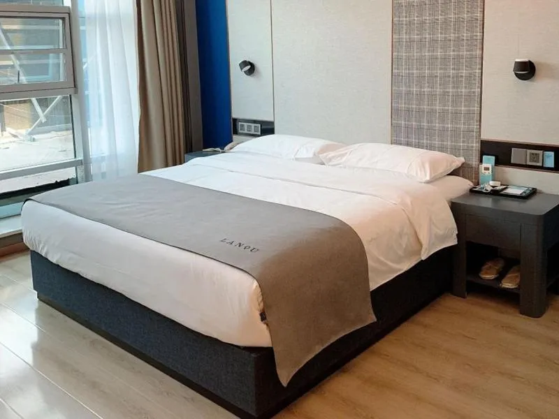 Bed in LanOu Hotel Linyi Lanling Agricultural Park