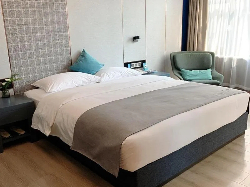 Bed in LanOu Hotel Linyi Lanling Agricultural Park