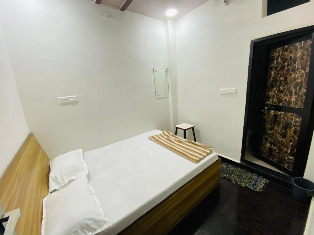 Bed in Hotel Arsh Palace